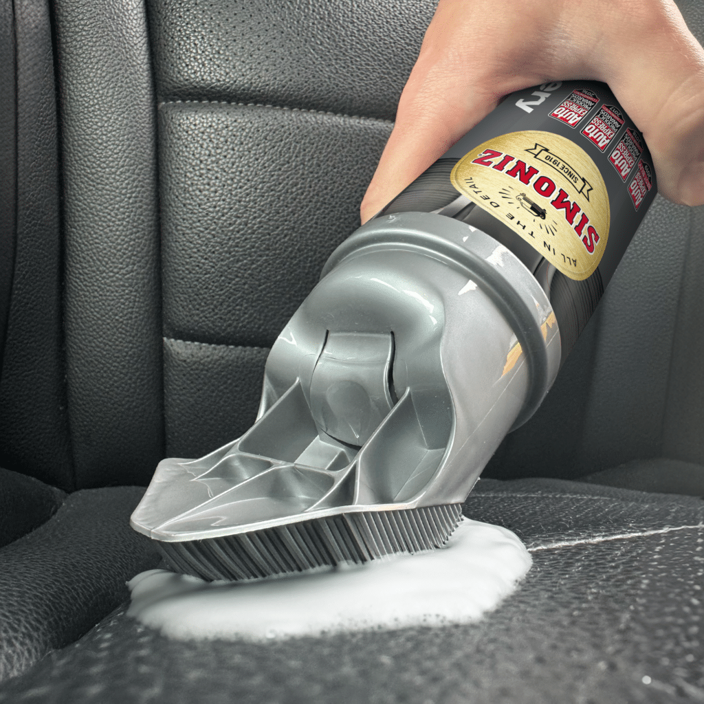 Simoniz Upholstery Carpet Cleaner being used on car back seats