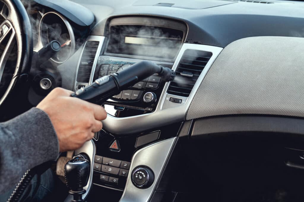 steam cleaning and disinfection of the car interior and air conditioning with a steam cleaner